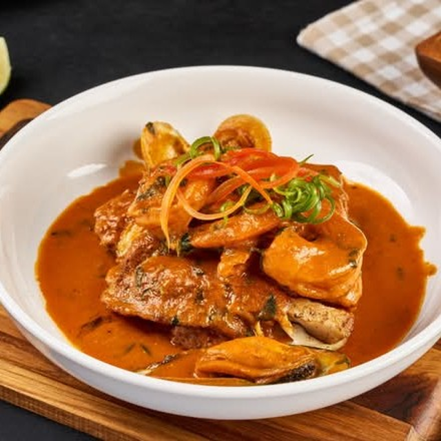 Pescado a lo Macho (Fish with Seafood Sauce).