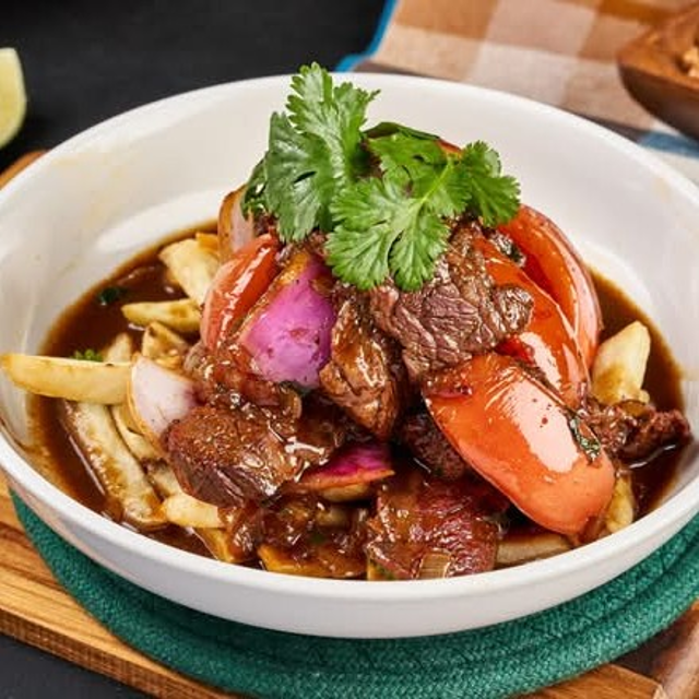 Lomo Saltado (Peruvian Filet Mignon Stir-Fry).