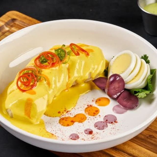Papa a la Huancaína (Potatoes in Creamy Yellow Pepper Cheese Sauce).