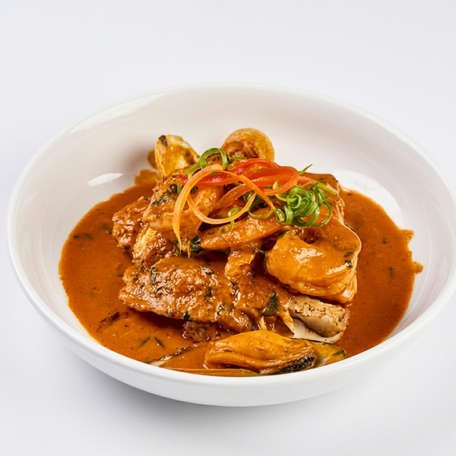 Pescado a lo Macho (Fish with Seafood Sauce).