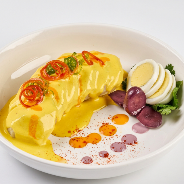 Papa a la Huancaína (Potatoes in Creamy Yellow Pepper Cheese Sauce).